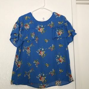 Blue flower shirt with ruffles
